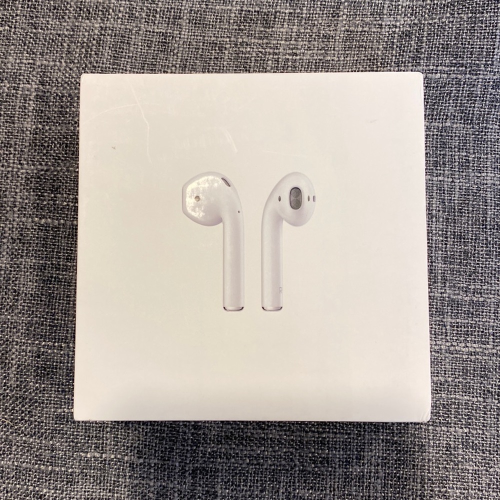 AirPods with Charging Case. New! Apple